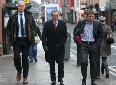 Munster's Paul O'Connell arrives for this morning's hearing with Munster Rugby PRO Pat Geraghty and team manager Shaun Payne