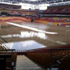 Floodwater turns Brisbane's Suncorp Stadium into a giant swimming pool on 12 January, 2011. (AP Photo)
