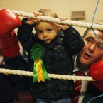 Little Billy Kelleher helps his dad, Fianna Fail candidate Billy Kelleher Snr, do the rounds at the Glen Boxing Club in Cork city.