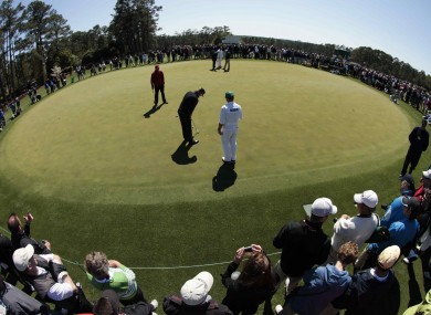Hunter Mahan lines up a putt during Tuesday's practice round.