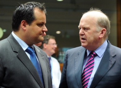 Michael Noonan speaking to the Dutch finance minister Jan Kees de Jager in Brussels last month.