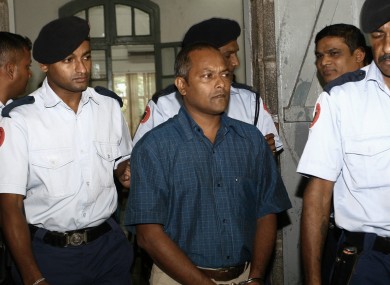 Sandip Moneea, one of the two suspects in the murder of Michaela McAreavey, is escorted to court earlier this week.