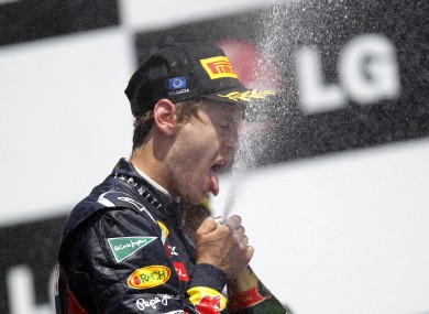 Tasty? Sebastian Vettel celebrates in Spain today.