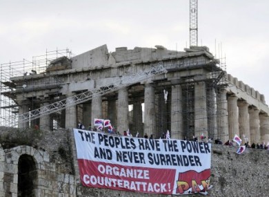 Anti-austerity demonstrators outside the Parthenon in Athens on Monday.