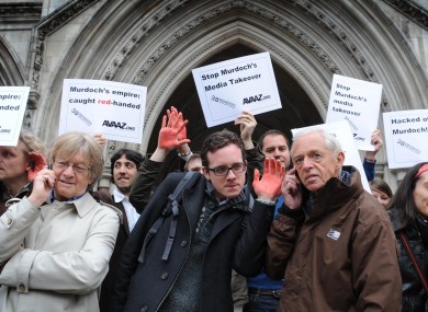 Demonstrators outside the High Court in London in April, where decisions were being made about the News of the World phone hacking case should proceed