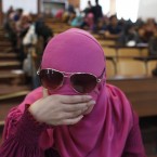 A Libyan student completes her final exam in a health course at university in Tripoli (AP Photo/Tara Todras-Whitehill)