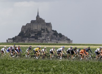 The pack passes world heritage site Mont Saint Michel.
