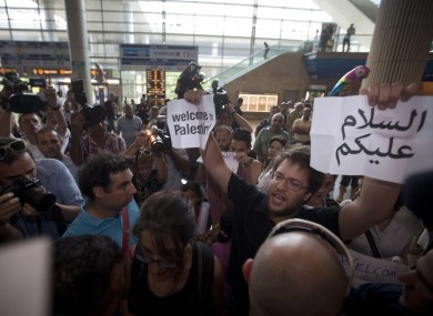 Protesters gather to welcome 'flytilla' members at Ben Gurion airport on Friday