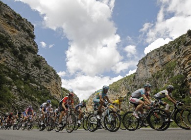 The pack rides through a canyon near Saint May.