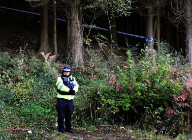 A police officer at the scene of the killing after Rebecca's body was found