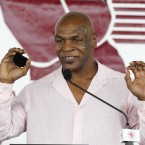 Mike Tyson was arrested following an airport scuffle with a photographer on 11 November 2009.