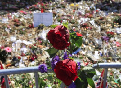 Floral tributes to the 77 victims of last month's attacks.