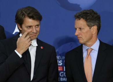 Geithner, right, with French finance minister Francois Baroin last week