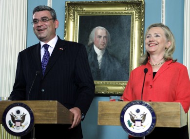 Romania's Foreign Minister Teodor Baconschi with US Secretary of State Hillary Clinton after signing the deal today.