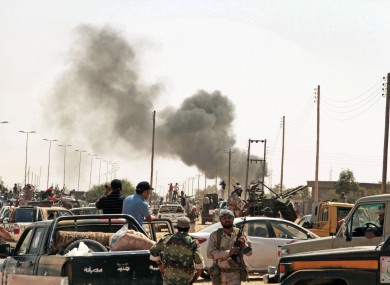 The battle between revolutionary fighters and Gaddafi loyalists continues along the roads of Sirte.