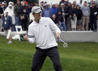 Rose celebrates his winning putt.