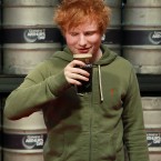 Ed Sheeran gets stuck in to his pint