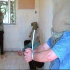 Another still from the video played at the inquiry shows the detainees handcuffed using so-called plasticuffs.