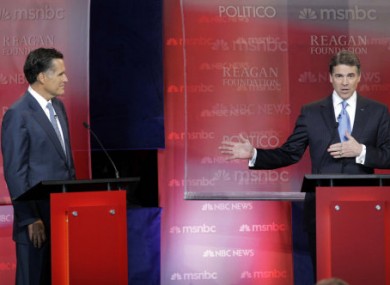 Texas Governor Rick Perry and Massachusetts Governor Mitt Romney in a presidential candidate debate last week.