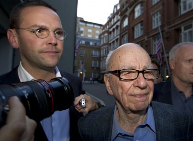 James and Rupert Murdoch outside the latter's house in London in July.