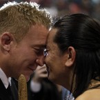 Toa Waaka greets Lloyd Burns of Wales during the Powhiri official welcoming ceremony for the Welsh team.
(AP Photo/Themba Hadebe)