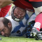 Argentina's Mario Ledesma, bottom, and Georgia's Davit Zirakashvili react after a scrum collapses.
(AP Photo/Natacha Pisarenko)