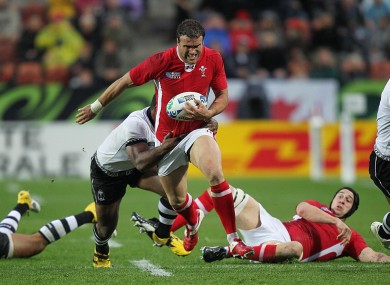 Jamie Roberts storms the Fijian line.