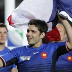 France's Dimitri Yachvili waves at the crowd after their Rugby World Cup quarter-final win against England.
(AP Photo/Christophe Ena)