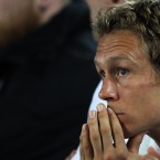 Jonny Wilkinson reacts on the bench as England fall in the quarter-finals against France.
(Lynne Cameron/PA Wire/Press Association Images)