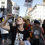Demonstrators march through the streets of Washington Saturday, Oct. 8, 2011, as part of the Occupy DC activities in the nation's capital. 

(AP Photo/Jose Luis Magana)
