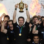 It's ours! New Zealand captain Richie McCaw celebrates with his teammates.
(David Davies/PA Wire/Press Association Images)