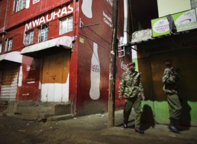 Kenyan police guard the scene of today's grenade attack at a Nairobi nightclub.