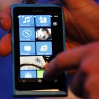 A Nokia employee demonstrates the Lumia 800 (AP Photo/Sang Tan)