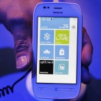 A visitor looks at a new Nokia Lumia 710 (AP Photo/Sang Tan)