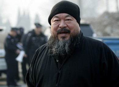 In this Nov. 17, 2010 file photo, artist Ai Weiwei arrives at the Wenyuhe court to support fellow artist Wu Yuren during his trial in Beijing.
