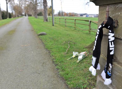 Flowers and a Newcastle United scarf outside Gary Speed's home Huntington Hall in Cheshire.