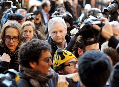 Assange arrives at the Royal Courts of Justice, in central London this morning