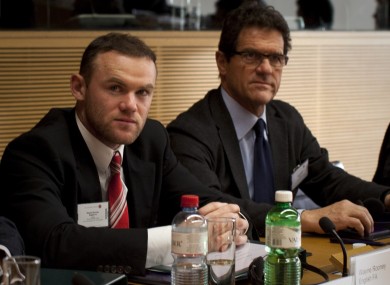 Wayne Rooney and England manager Fabio Capello at this morning's hearing in Nyon.