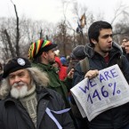 A protester hold a home-made sign (AP Photo/Sergey Ponomarev)