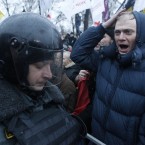 A protester shouts slogans in front of police lines (AP Photo/Mikhail Metzel)