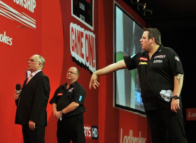 Adrian Lewis in action against Wayne Jones at London's Alexandra Palace last night. Lewis won their last 16 match 4-0.