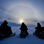 People on ski-doos on the island of Spitsbergen on the Svalbard archipelago in the Arctic circle. (PA)