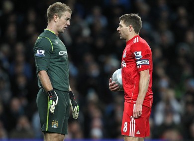 Steven Gerrard eyeballs Joe Hart before taking a penalty last night.