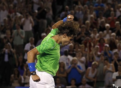Rafael Nadal punches the air in delight after beating Tomas Berdych to book his place in the Australian Open semi-finals.