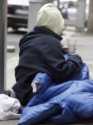 A homeless woman, Chantal, begging in Dublin.