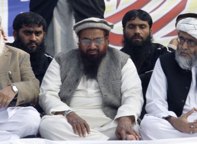 Hafiz Saeed, centre, the leader of a banned Islamic group Jamaat-ud-Dawa, an alias of the proscribed Lashkar -e-Taiba terror group,