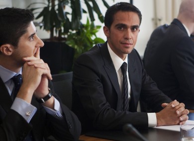 Spanish cyclist Alberto Contador, centre, and his lawyer Andy Ramos at CAS this week.