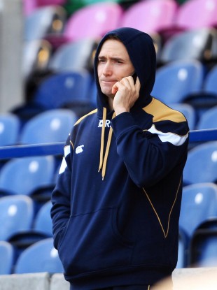 Parks watches Scotland's training from the stands at Murrayfield today.