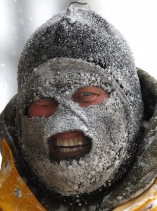 Ice Man: Steve Sealow clears pathways in downtown Appleton, Wisconsin.