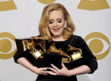 Adele with her armful of awards